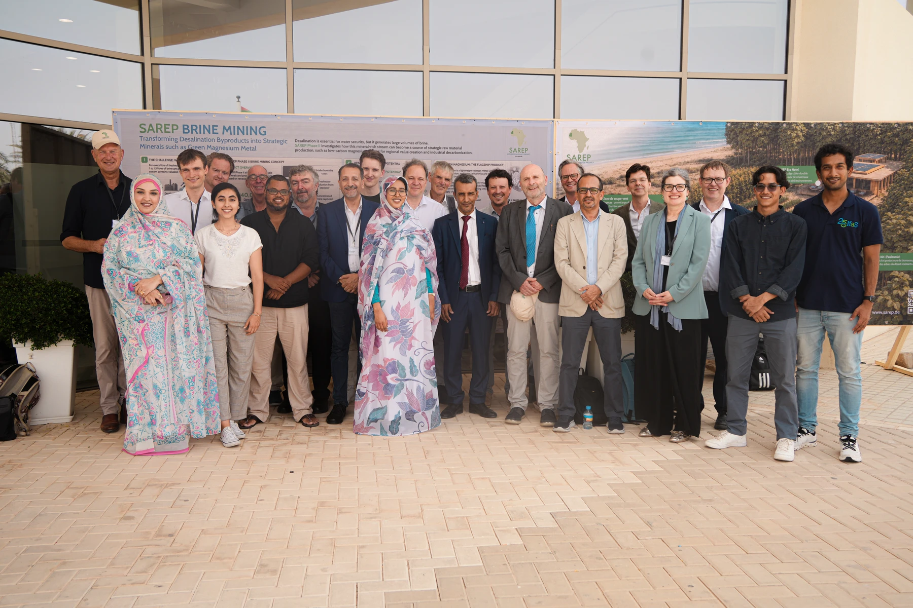 Conference participants in front of the SAREP exhibition